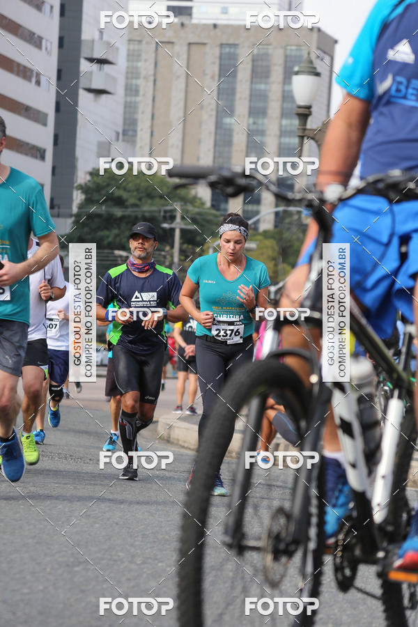 Buy your photos of the eventMeia Maratona Internacional de Curitiba 2018 on Fotop