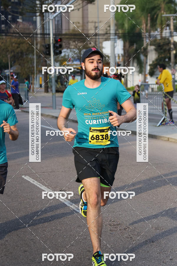 Buy your photos of the eventMeia Maratona Internacional de Curitiba 2018 on Fotop