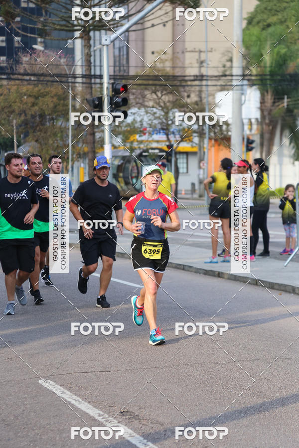 Buy your photos of the eventMeia Maratona Internacional de Curitiba 2018 on Fotop