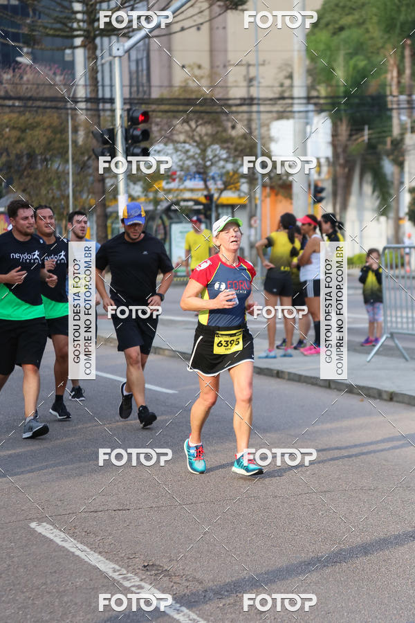 Buy your photos of the eventMeia Maratona Internacional de Curitiba 2018 on Fotop