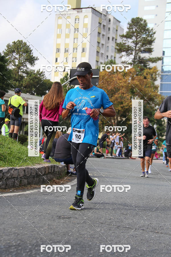 Buy your photos of the eventMeia Maratona Internacional de Curitiba 2018 on Fotop
