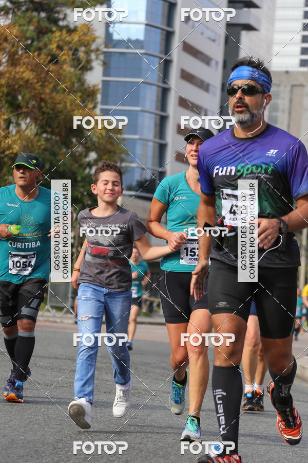 Buy your photos of the eventMeia Maratona Internacional de Curitiba 2018 on Fotop