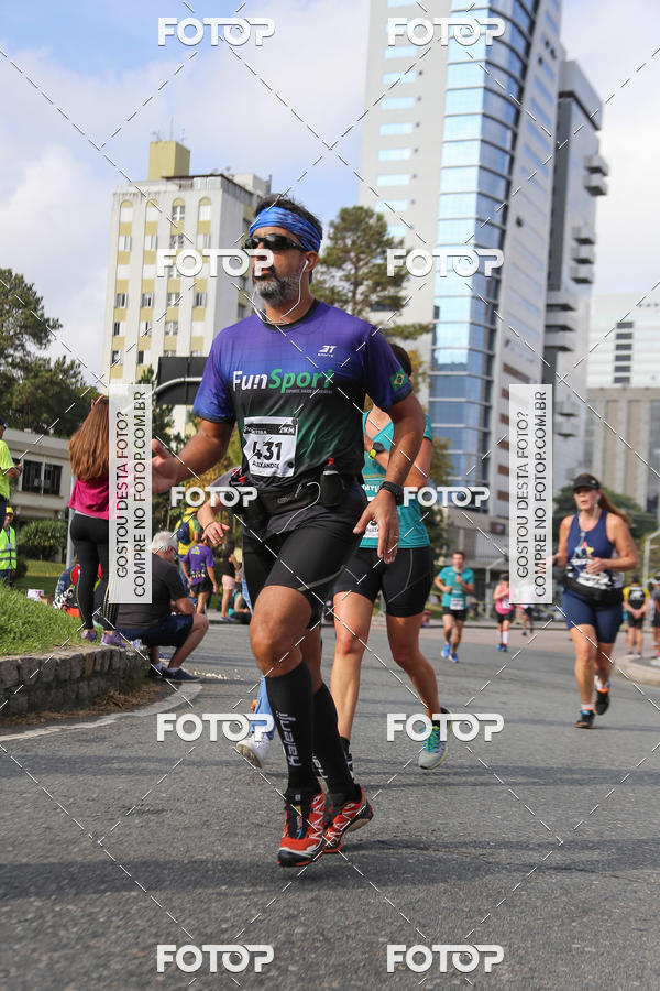 Buy your photos of the eventMeia Maratona Internacional de Curitiba 2018 on Fotop