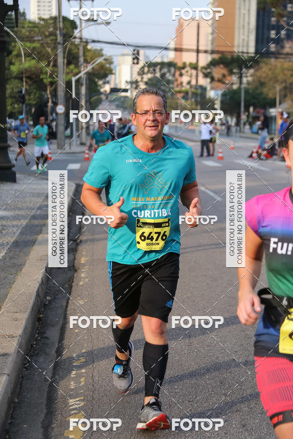 Buy your photos of the eventMeia Maratona Internacional de Curitiba 2018 on Fotop