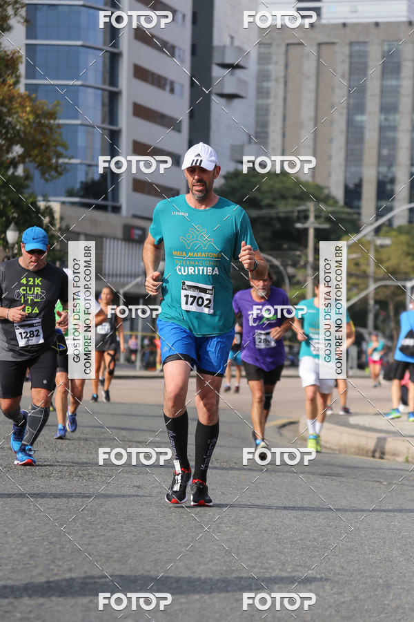 Buy your photos of the eventMeia Maratona Internacional de Curitiba 2018 on Fotop