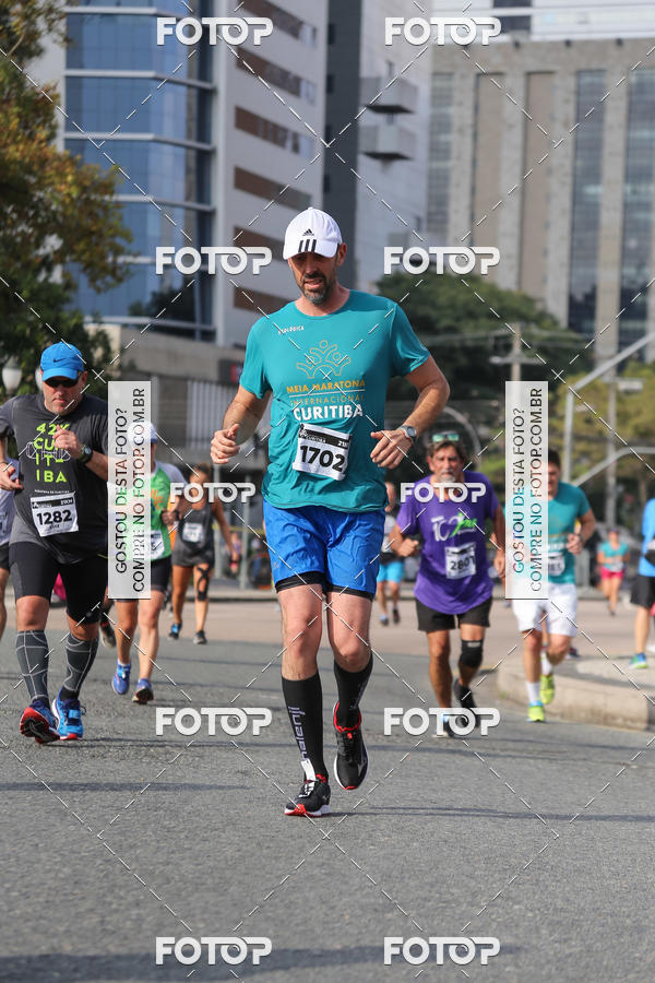 Buy your photos of the eventMeia Maratona Internacional de Curitiba 2018 on Fotop