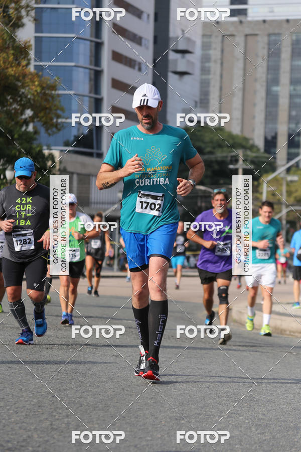 Buy your photos of the eventMeia Maratona Internacional de Curitiba 2018 on Fotop