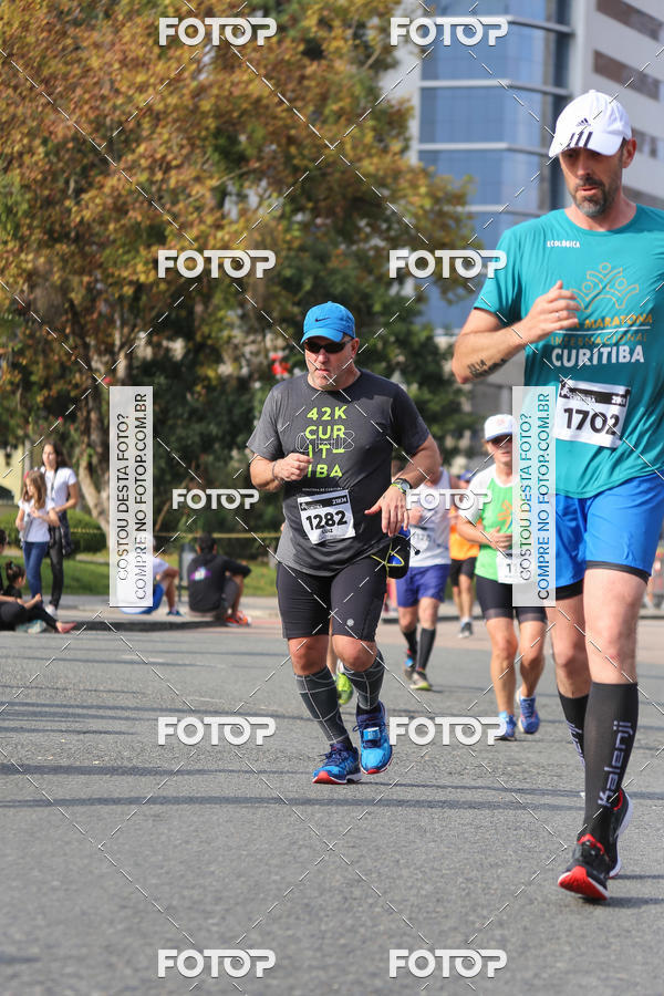 Buy your photos of the eventMeia Maratona Internacional de Curitiba 2018 on Fotop