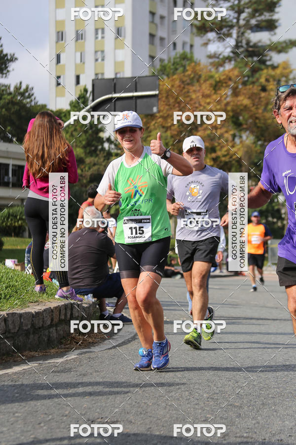Buy your photos of the eventMeia Maratona Internacional de Curitiba 2018 on Fotop