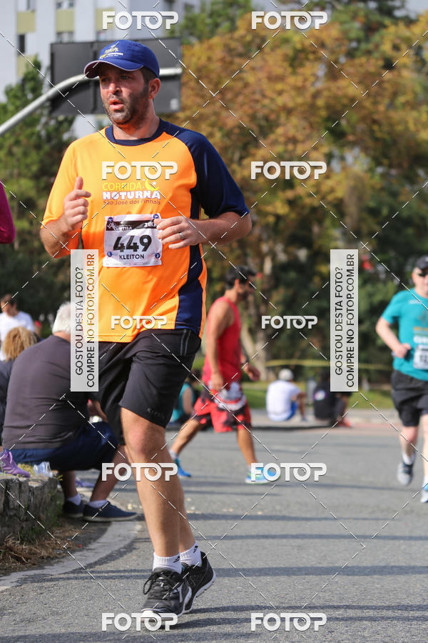 Buy your photos of the eventMeia Maratona Internacional de Curitiba 2018 on Fotop