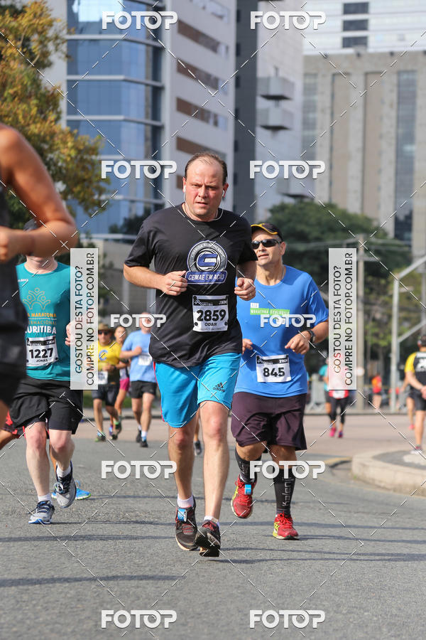 Buy your photos of the eventMeia Maratona Internacional de Curitiba 2018 on Fotop