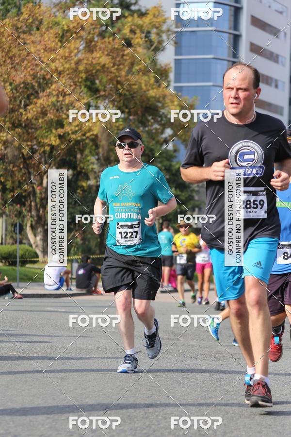 Buy your photos of the eventMeia Maratona Internacional de Curitiba 2018 on Fotop