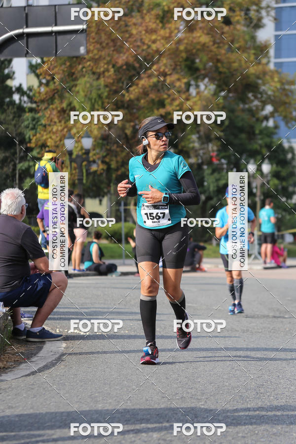 Buy your photos of the eventMeia Maratona Internacional de Curitiba 2018 on Fotop
