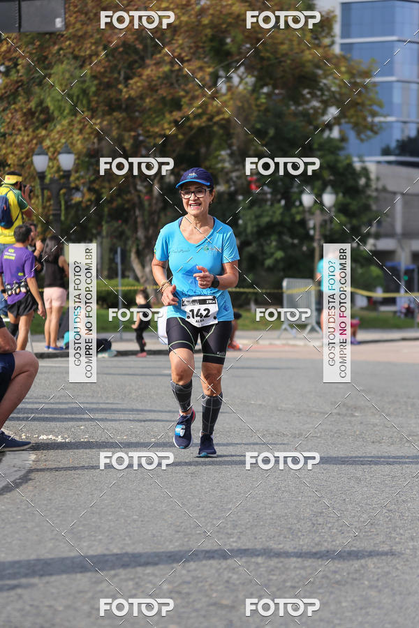 Buy your photos of the eventMeia Maratona Internacional de Curitiba 2018 on Fotop