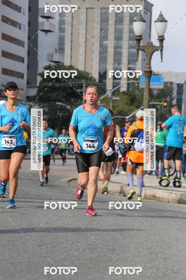 Buy your photos of the eventMeia Maratona Internacional de Curitiba 2018 on Fotop