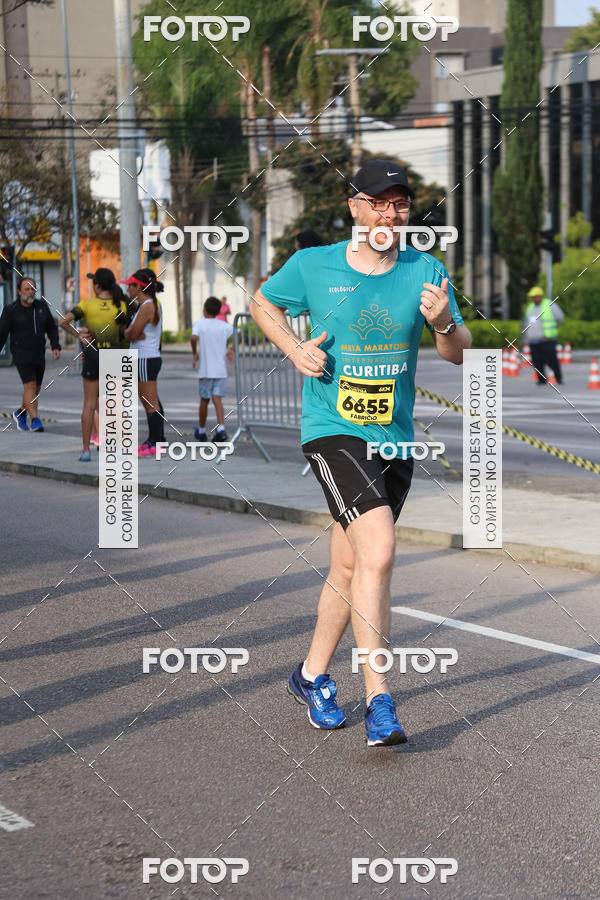 Buy your photos of the eventMeia Maratona Internacional de Curitiba 2018 on Fotop