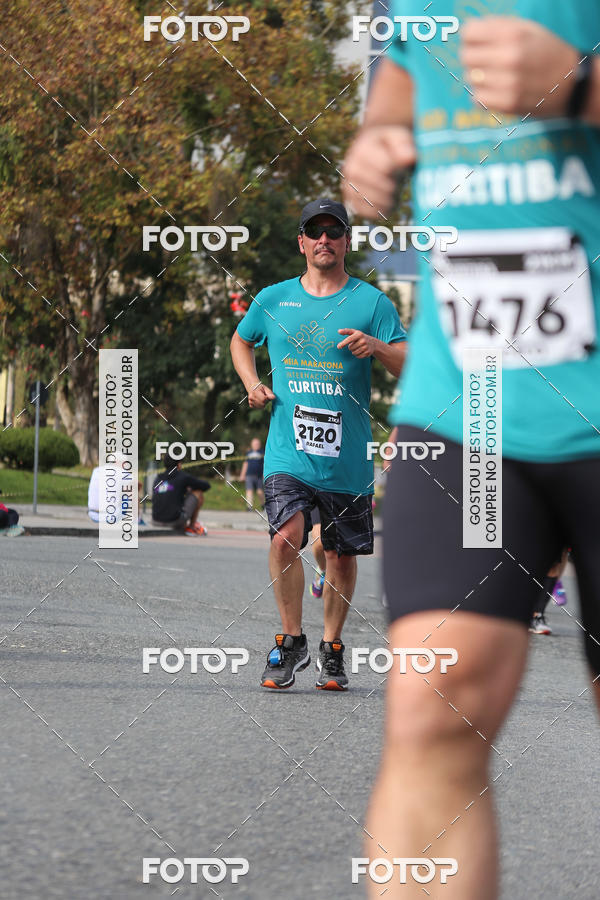 Buy your photos of the eventMeia Maratona Internacional de Curitiba 2018 on Fotop