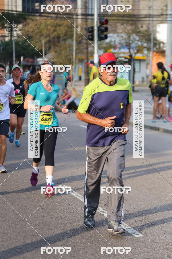 Buy your photos of the eventMeia Maratona Internacional de Curitiba 2018 on Fotop