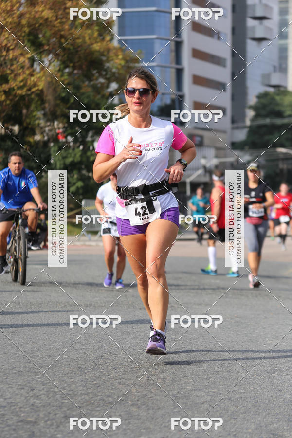 Buy your photos of the eventMeia Maratona Internacional de Curitiba 2018 on Fotop