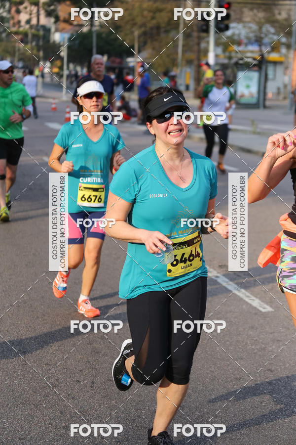 Buy your photos of the eventMeia Maratona Internacional de Curitiba 2018 on Fotop
