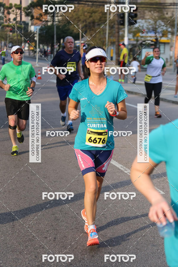 Buy your photos of the eventMeia Maratona Internacional de Curitiba 2018 on Fotop