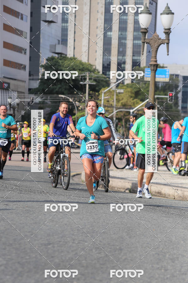 Buy your photos of the eventMeia Maratona Internacional de Curitiba 2018 on Fotop