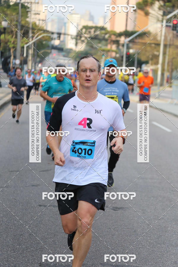 Buy your photos of the eventMeia Maratona Internacional de Curitiba 2018 on Fotop
