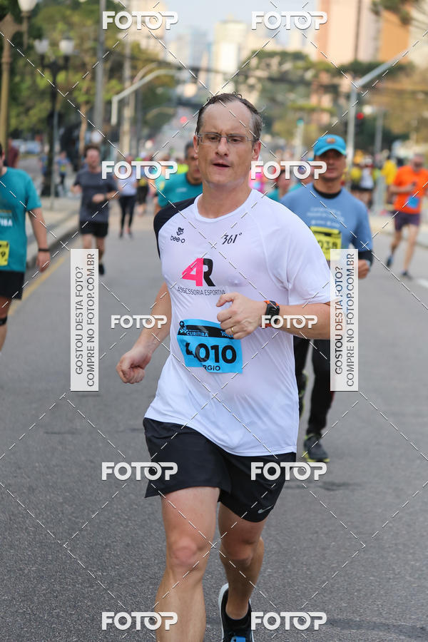 Buy your photos of the eventMeia Maratona Internacional de Curitiba 2018 on Fotop