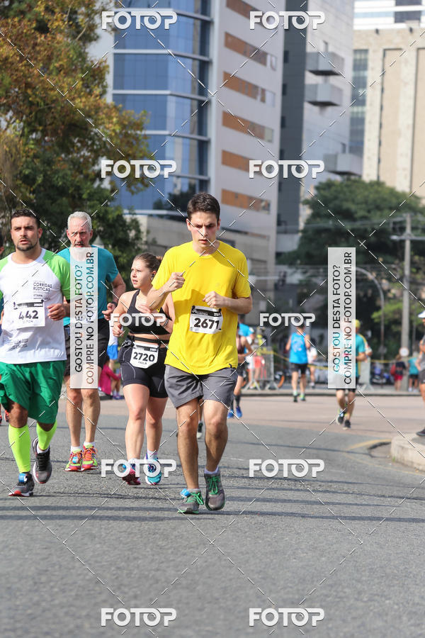 Buy your photos of the eventMeia Maratona Internacional de Curitiba 2018 on Fotop