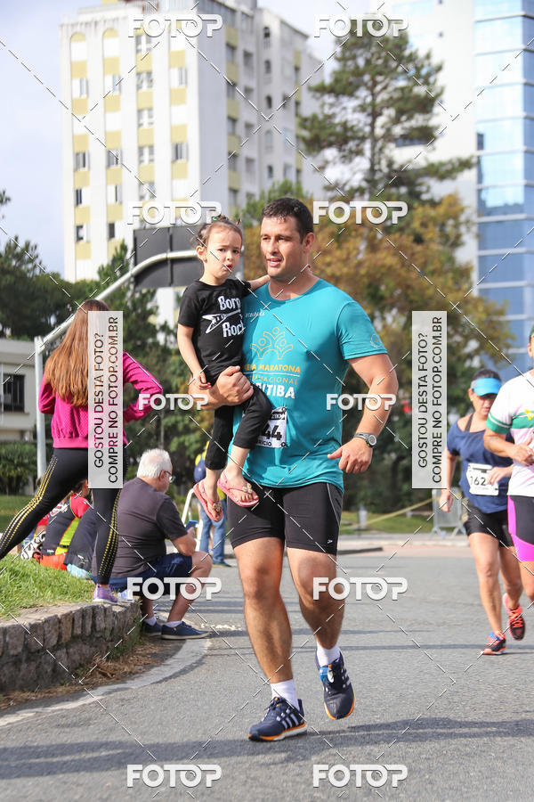 Buy your photos of the eventMeia Maratona Internacional de Curitiba 2018 on Fotop