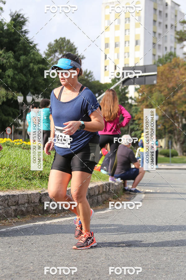 Buy your photos of the eventMeia Maratona Internacional de Curitiba 2018 on Fotop