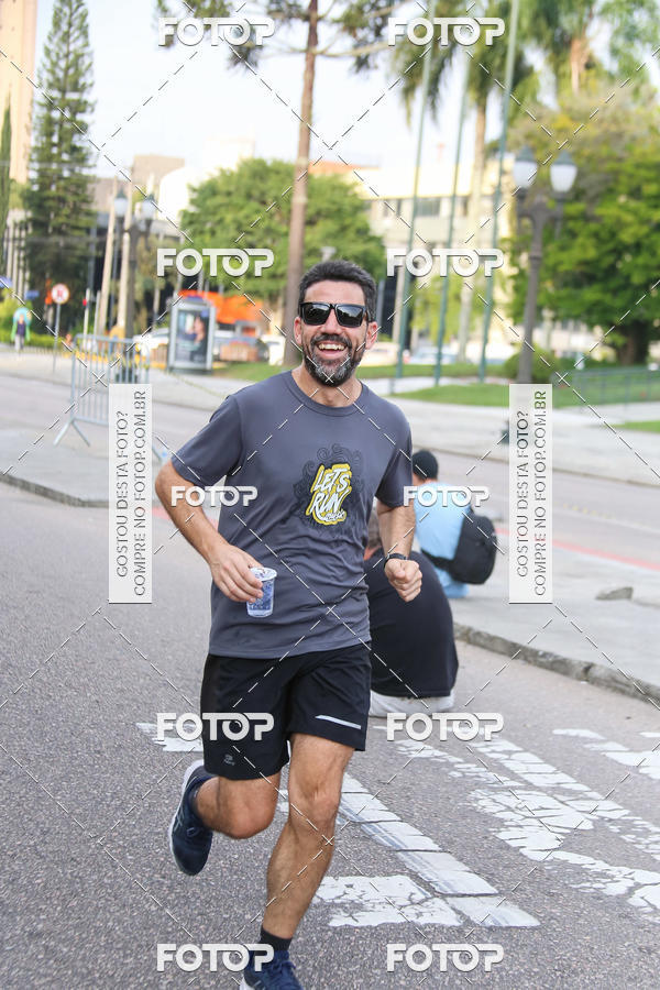 Buy your photos of the eventMeia Maratona Internacional de Curitiba 2018 on Fotop