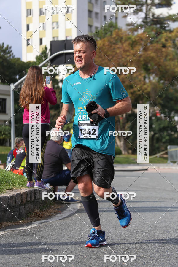 Buy your photos of the eventMeia Maratona Internacional de Curitiba 2018 on Fotop