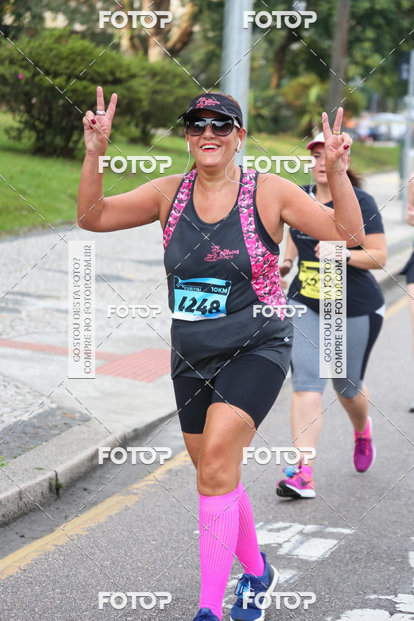 Buy your photos of the eventMeia Maratona Internacional de Curitiba 2018 on Fotop