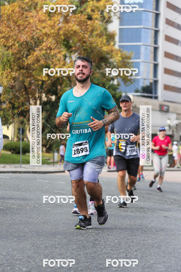 Buy your photos of the eventMeia Maratona Internacional de Curitiba 2018 on Fotop