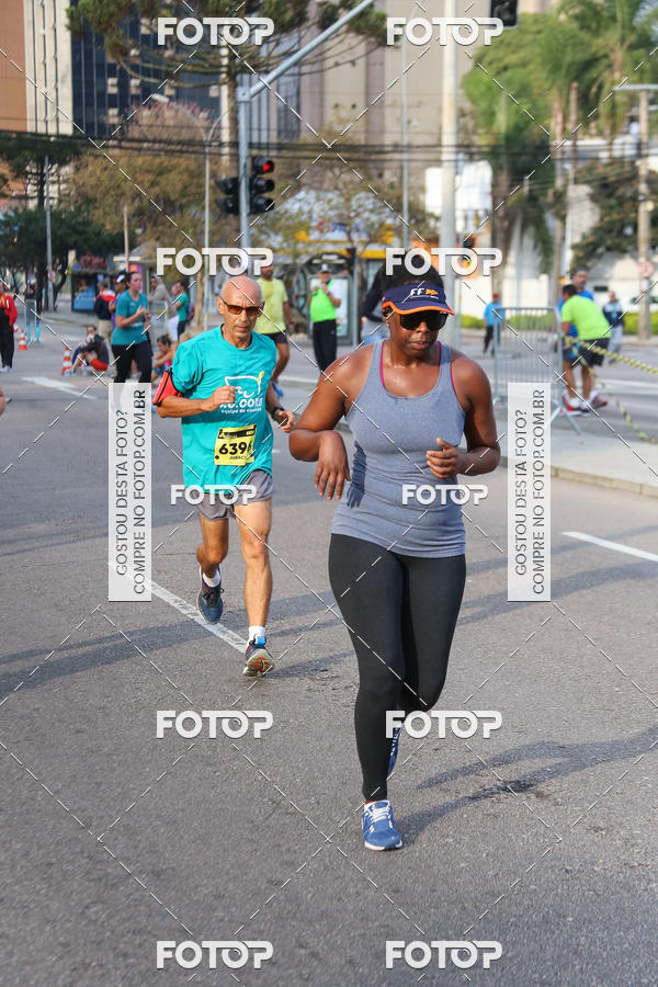 Buy your photos of the eventMeia Maratona Internacional de Curitiba 2018 on Fotop
