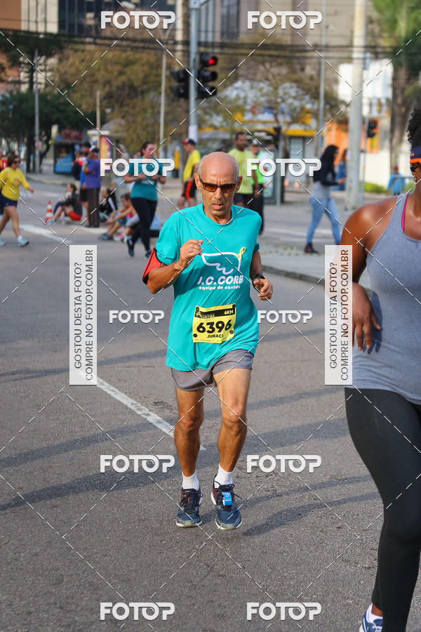 Buy your photos of the eventMeia Maratona Internacional de Curitiba 2018 on Fotop