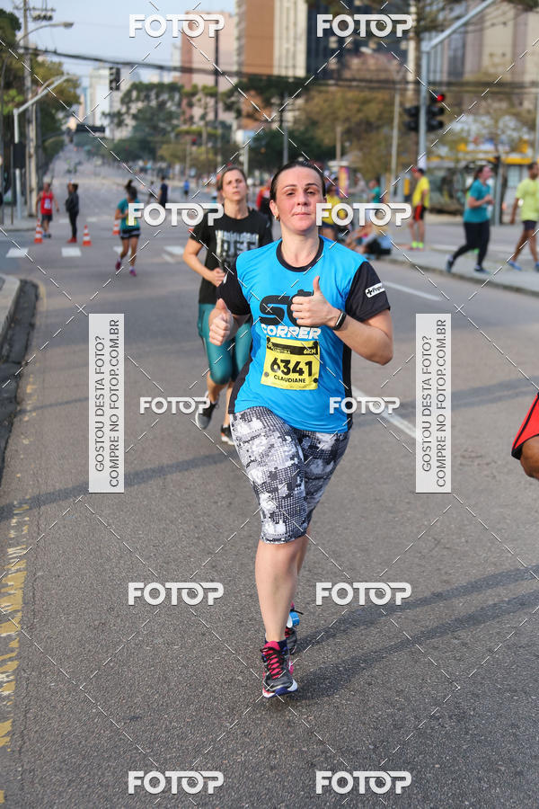 Buy your photos of the eventMeia Maratona Internacional de Curitiba 2018 on Fotop