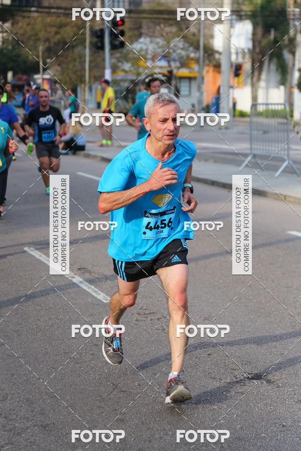 Buy your photos of the eventMeia Maratona Internacional de Curitiba 2018 on Fotop