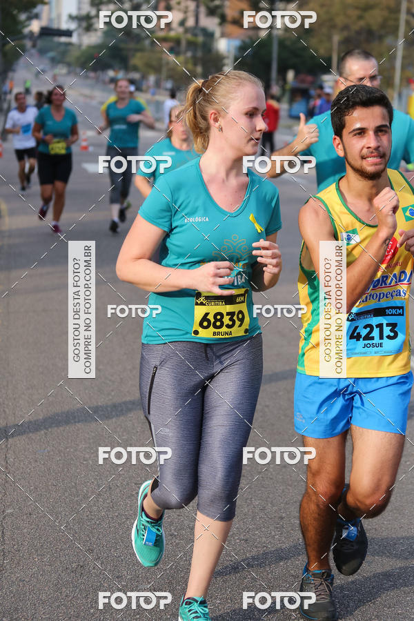 Buy your photos of the eventMeia Maratona Internacional de Curitiba 2018 on Fotop