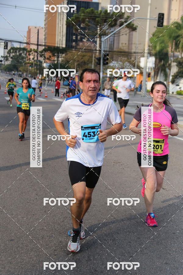 Buy your photos of the eventMeia Maratona Internacional de Curitiba 2018 on Fotop