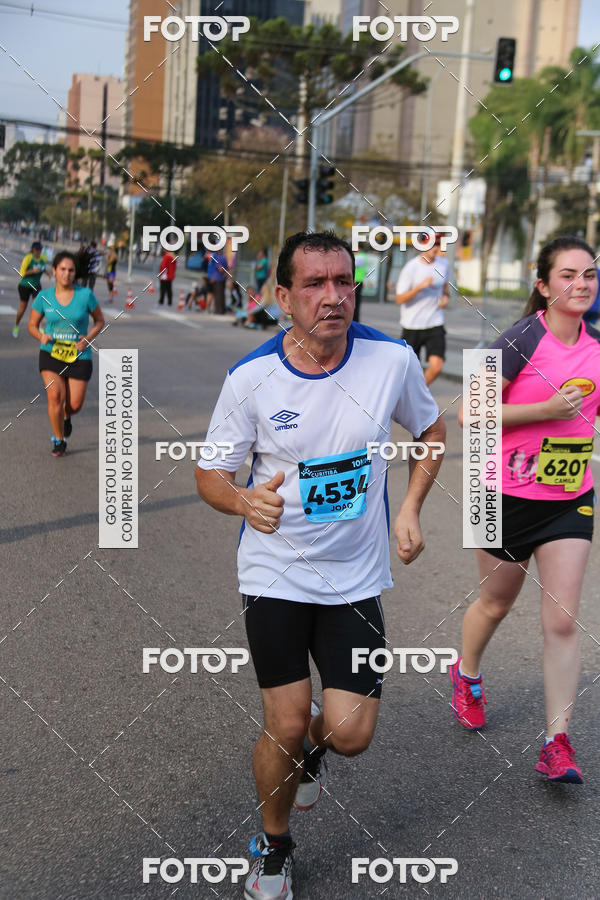 Buy your photos of the eventMeia Maratona Internacional de Curitiba 2018 on Fotop