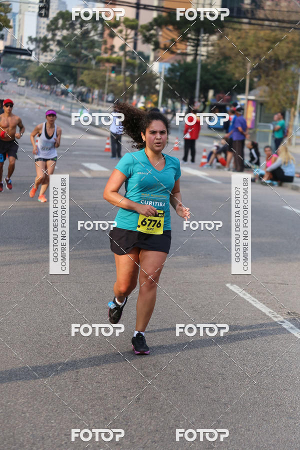 Buy your photos of the eventMeia Maratona Internacional de Curitiba 2018 on Fotop