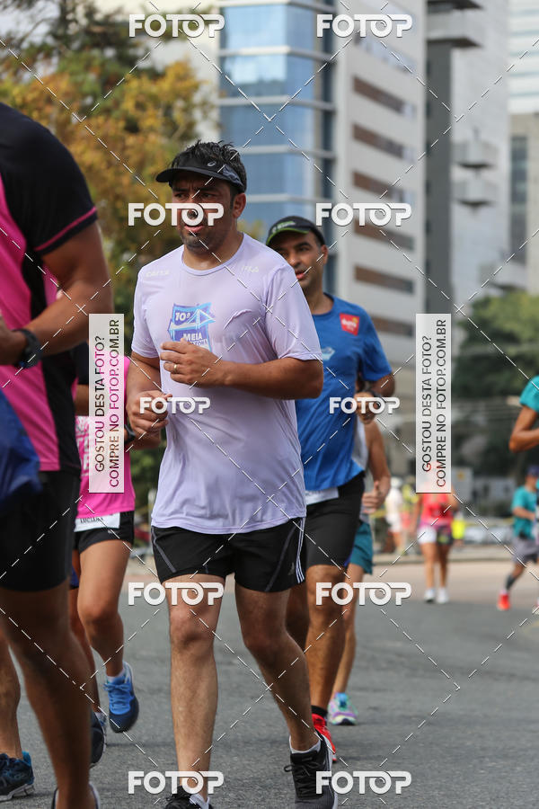 Buy your photos of the eventMeia Maratona Internacional de Curitiba 2018 on Fotop