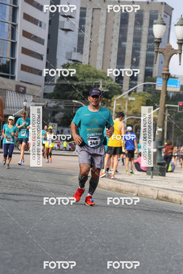 Buy your photos of the eventMeia Maratona Internacional de Curitiba 2018 on Fotop