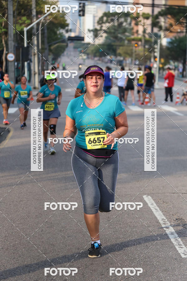 Buy your photos of the eventMeia Maratona Internacional de Curitiba 2018 on Fotop