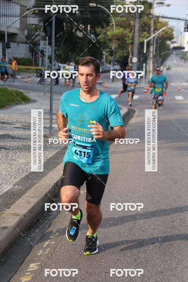 Buy your photos of the eventMeia Maratona Internacional de Curitiba 2018 on Fotop