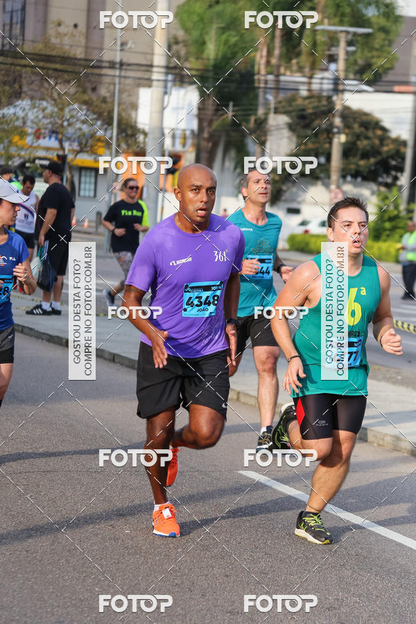 Buy your photos of the eventMeia Maratona Internacional de Curitiba 2018 on Fotop