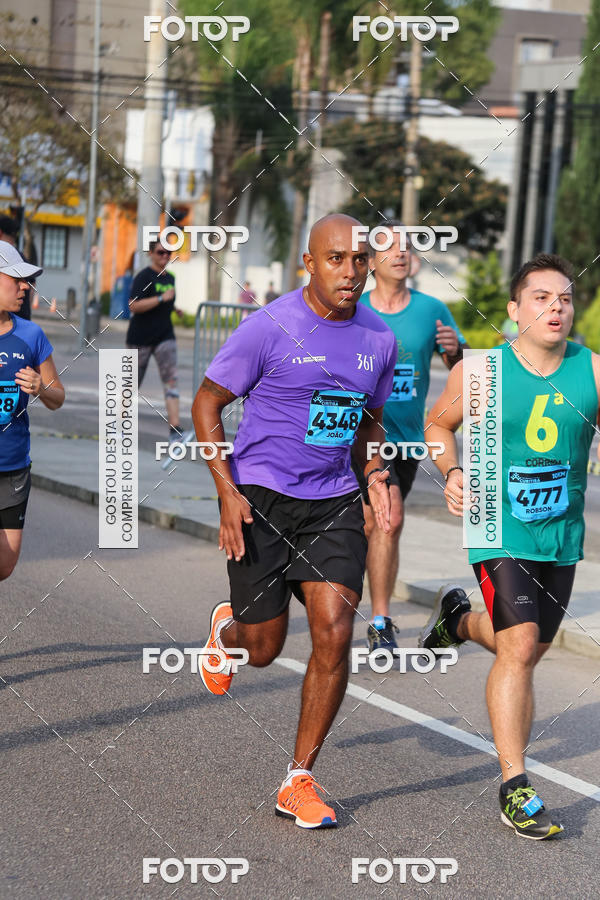 Buy your photos of the eventMeia Maratona Internacional de Curitiba 2018 on Fotop