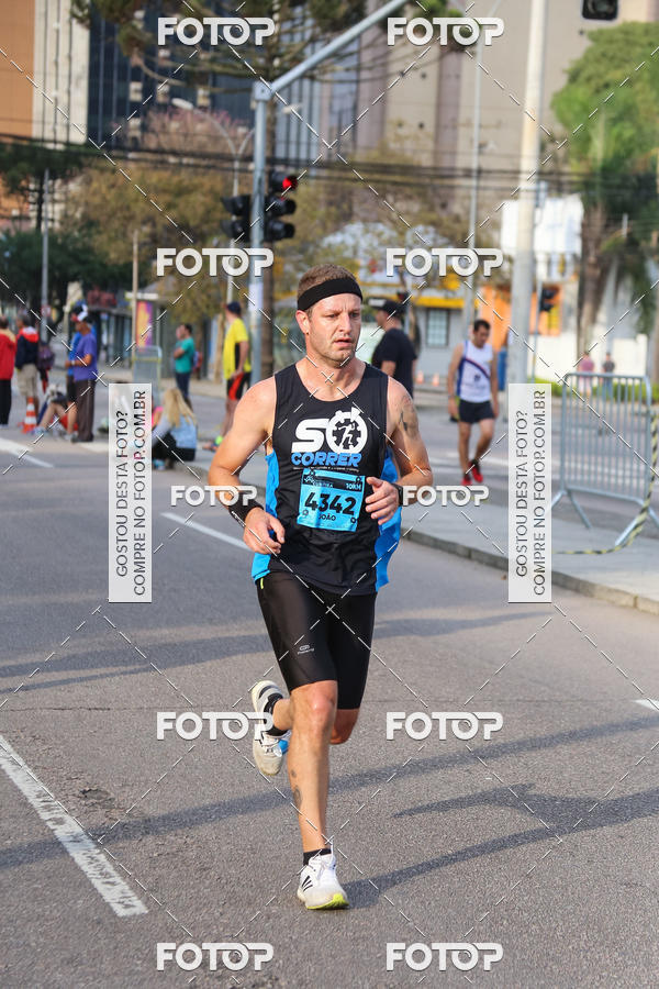 Buy your photos of the eventMeia Maratona Internacional de Curitiba 2018 on Fotop